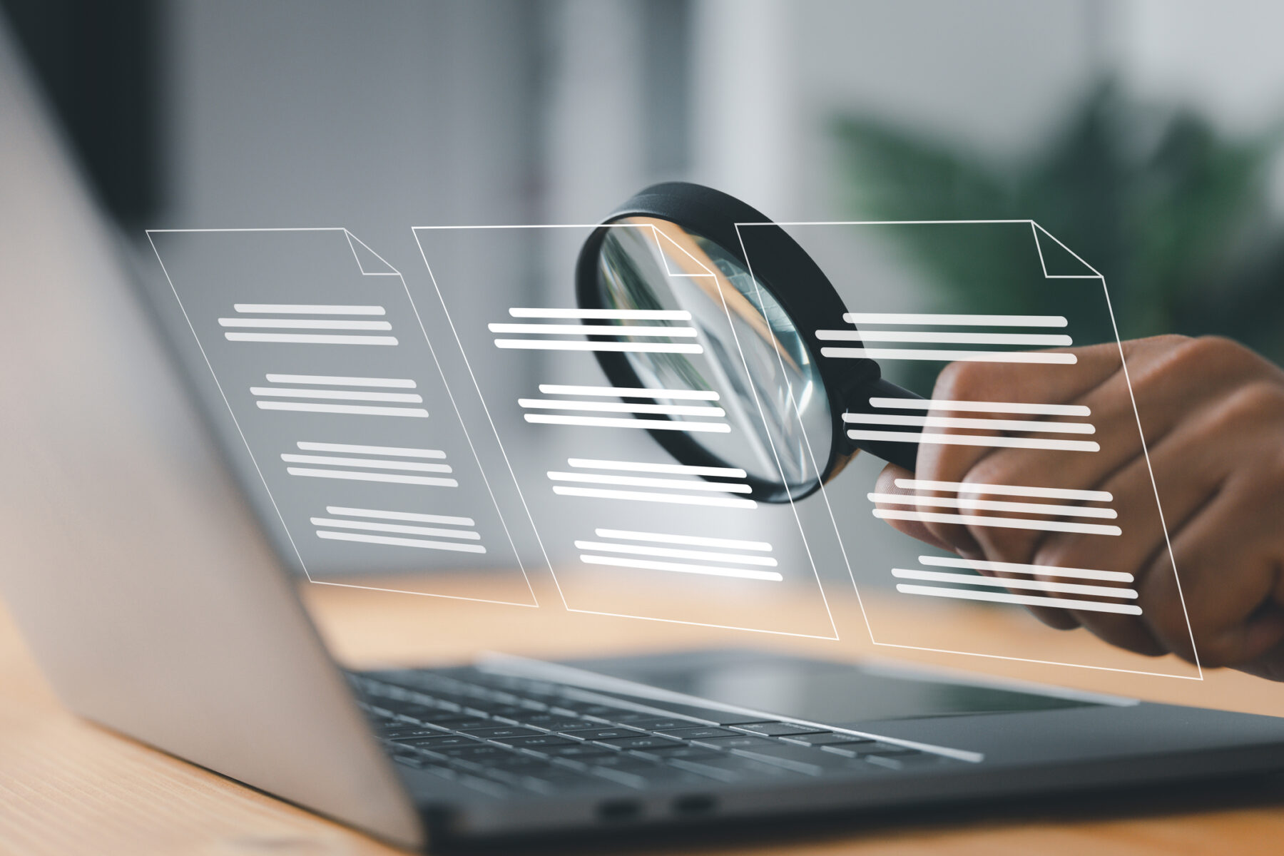 A man inspects paper with a magnifying lens. Business analysis, auditing, professional document review, inquiry, and inspection are all concepts.