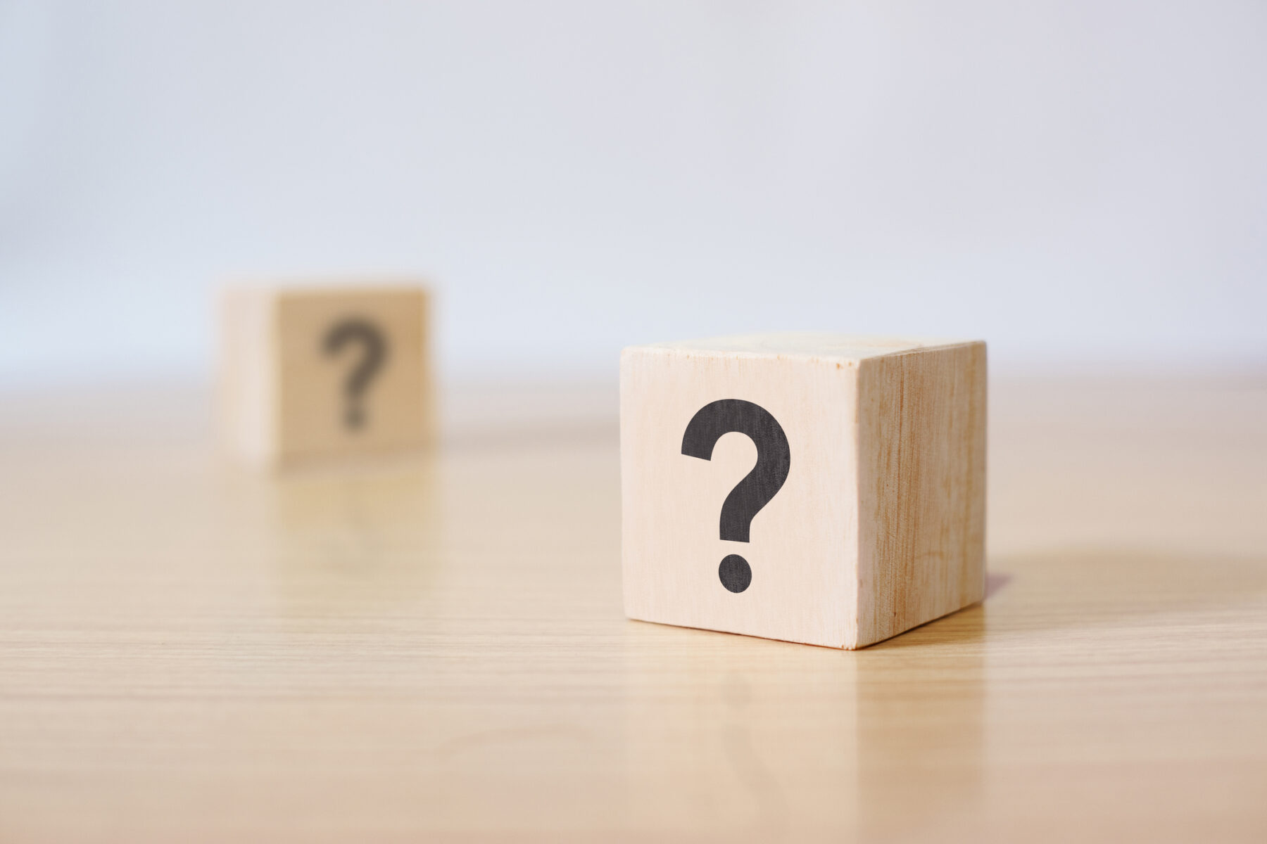 Frequently Asked Questions  Q and A Icons on Wooden Block for Website and Social Media