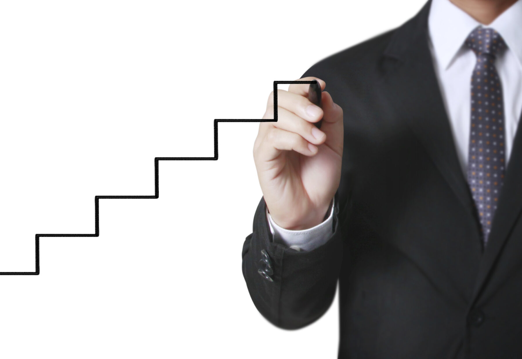 Businessman drawing graphics